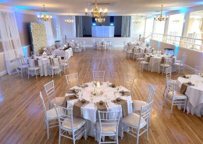 A view of the tables and DJ setup inside the Nahant Country Club